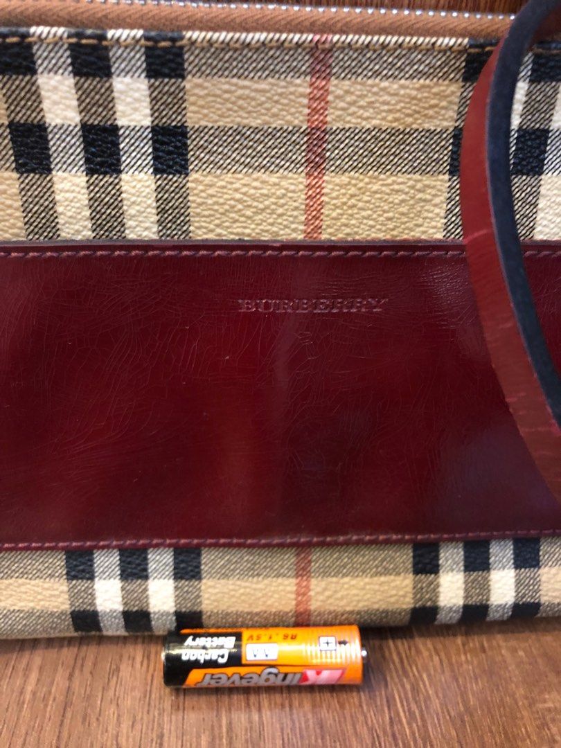 Burberry shoulder bag (Category: Luxury Bags & Wallets) located in Baguio. Submitted by nalyns_unique_finds (Listing ID 1350461580, Image 2). Description: Vintage Burberry Pochette handbag, Nova check and red leather Vintage Burberry Pochette handbag, Nova check and red leather.