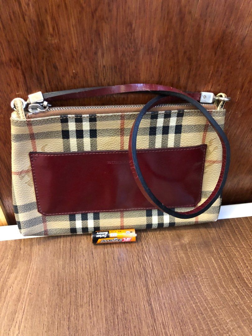 Burberry shoulder bag (Category: Luxury Bags & Wallets) located in Baguio. Submitted by nalyns_unique_finds (Listing ID 1350461580, Image 1). Description: Vintage Burberry Pochette handbag, Nova check and red leather Vintage Burberry Pochette handbag, Nova check and red leather.