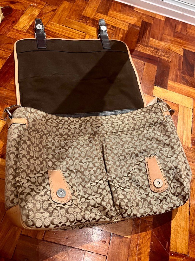 Coach Messenger/Laptop Bag (Category: Laptop Bags & Sleeves) located in Bacoor. Submitted by hundeclutters (Listing ID 1350467265, Image 3). Description: Coach Messenger Bag LOTS of compartments Friend sold this to me and I had it dry cleaned Fits laptop and perfect for office 💼💻 Laptop sleeve in another listing, let me know if you want to get both :) RFS: Need 💰.
