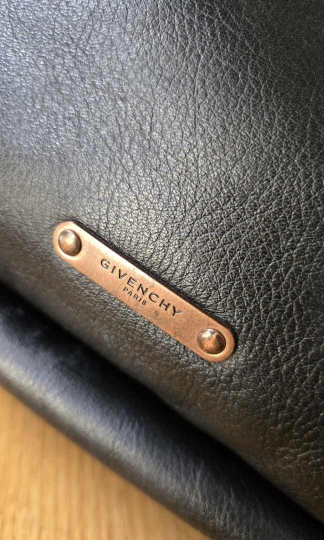 Givenchy Leather Backpack (Category: Luxury Bags & Wallets) located in Makati City. Submitted by mickeypd (Listing ID 1350433339, Image 3). Description: givenchy backpack with rosegold studs on strap.