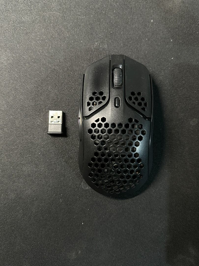 HyperX Pulsefire Haste WIRELESS Gaming Mouse (Category: Mouse & Mousepads) located in Quezon City. Submitted by jeps-sells (Listing ID 1350434104, Image 3). Description: - 61g with Pixart 3335 Sensor (up to 16,000 DPI) - 100 hours of battery life and RGB lighting - Compatible with PC, PS5/PS4, Xbox Series X|S/Xbox One **Condition: Well-used, scroll wheel issue, still functional for gaming and general use - Shipping: Buyer to cover (Grab, Lalamove