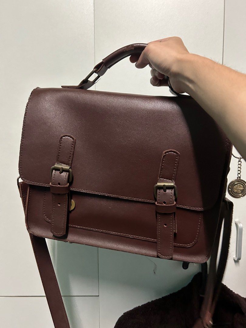 Leather satchel 13” (Category: Cross-body Bags) located in Caloocan City. Submitted by zonezoneozone (Listing ID 1350540059, Image 1). Description: Vegan leather, fits a 13 inch laptop.