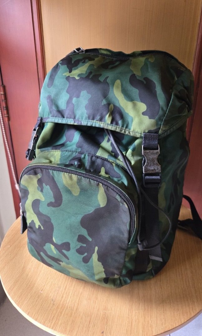 Original Prada Camou Backpack (Category: Luxury Bags & Wallets) located in Makati City. Submitted by mickeypd (Listing ID 1350429776, Image 1). Description: original backpack with dustbag and authenticity card.