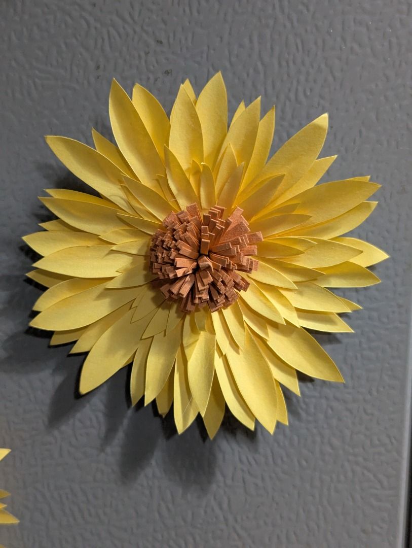 Paper Flower Magnets - Sunflower (Category: Flowers & Bouquets) located in Paranaque City. Submitted by books.etcetera (Listing ID 1350525707, Image 1). Description: Each paper flower magnet is handcrafted with love. Dimensions: 10x10cm 175 php per piece 875 php per assorted pack of 6 (108 php per piece) .