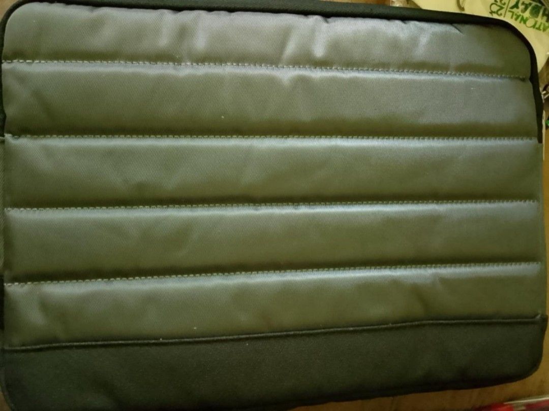 Poss laptop sleeve bag (Category: Laptop Bags & Sleeves) located in Quezon City. Submitted by annyeong9 (Listing ID 1350528567, Image 1). Description: From Poss bag collection. Very soft and fashionable laptop sleeve bag to protect your gadgets. Colored black and gray. Flawless and almost new. P980. See pictures for details and price..