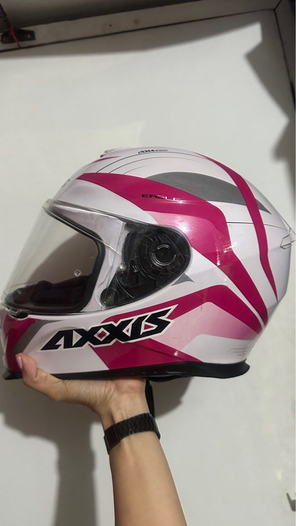 Axxis Spain Eagle Phaser OOAA Design Helmet in Pink (Category: Helmets and other Riding Gears) located in Cainta. Submitted by margtu (Listing ID 1345342050, Image 3). Description: Full face Single visor (comes with extra sun visor. Clear visor pre installed) With ECE Homologation DAXS- 00006 Size: MEDIUM 57-58 Inner pads are detachable and washable. Still intact and as thick as new. Rarely used. RFS: We have 4 extra helmets. HONEST ISSUES: light