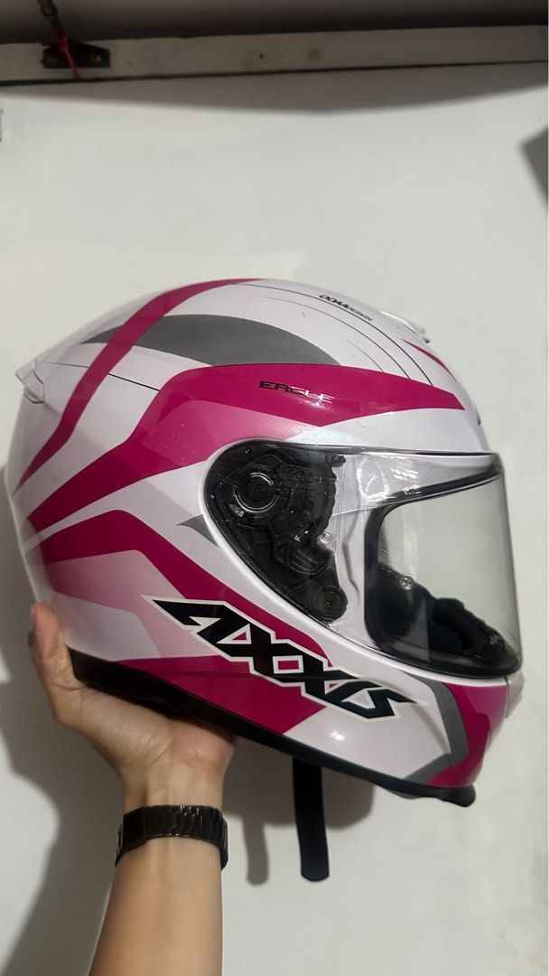 Axxis Spain Eagle Phaser OOAA Design Helmet in Pink (Category: Helmets and other Riding Gears) located in Cainta. Submitted by margtu (Listing ID 1345342050, Image 1). Description: Full face Single visor (comes with extra sun visor. Clear visor pre installed) With ECE Homologation DAXS- 00006 Size: MEDIUM 57-58 Inner pads are detachable and washable. Still intact and as thick as new. Rarely used. RFS: We have 4 extra helmets. HONEST ISSUES: light