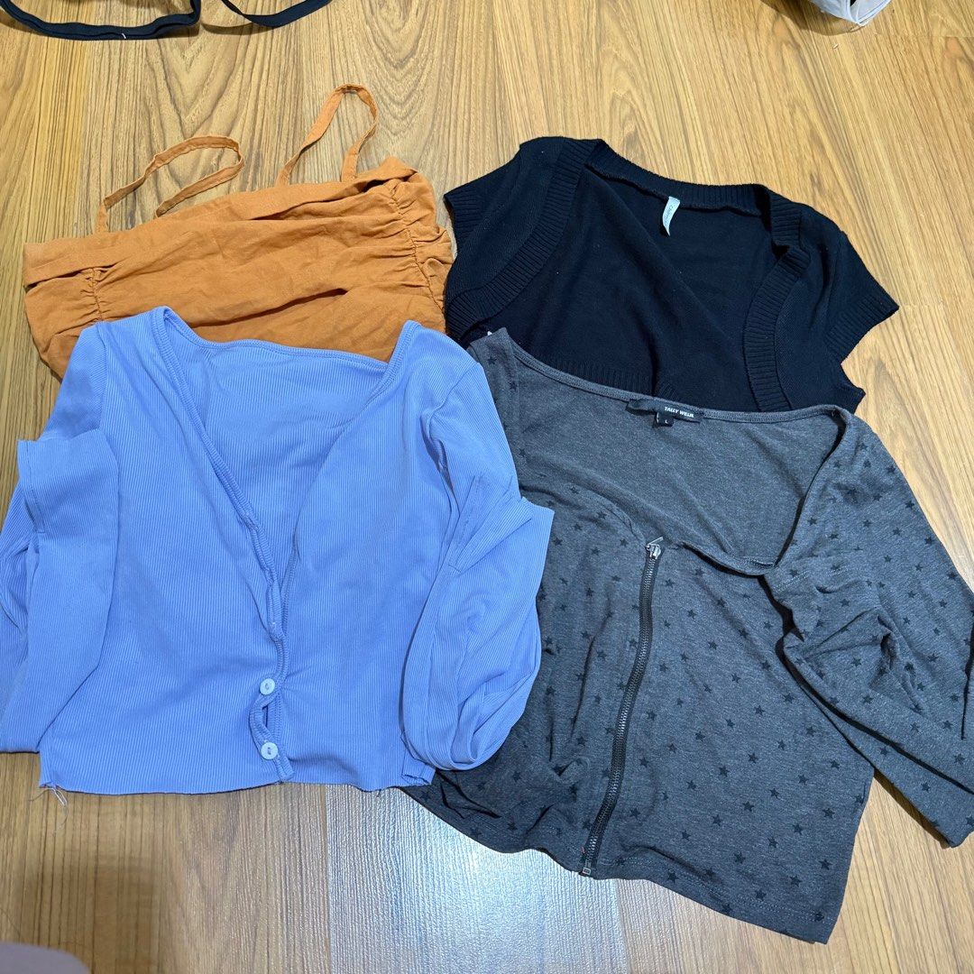 Basic long sleeves black bolero tops (Category: Longsleeves) located in Taguig. Submitted by dashishop (Listing ID 1345377338, Image 2). Description: Get all for 300. Only issue is blue longsleeve with missing buttons. All fits XS except for black longsleeve which fits S-M. Large on tag but size runs small RFS: closet space.