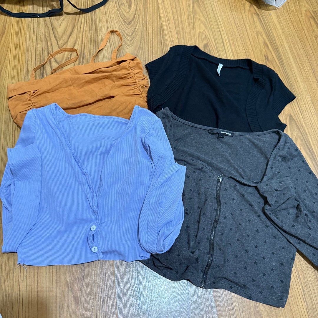 Basic long sleeves black bolero tops (Category: Longsleeves) located in Taguig. Submitted by dashishop (Listing ID 1345377338, Image 1). Description: Get all for 300. Only issue is blue longsleeve with missing buttons. All fits XS except for black longsleeve which fits S-M. Large on tag but size runs small RFS: closet space.