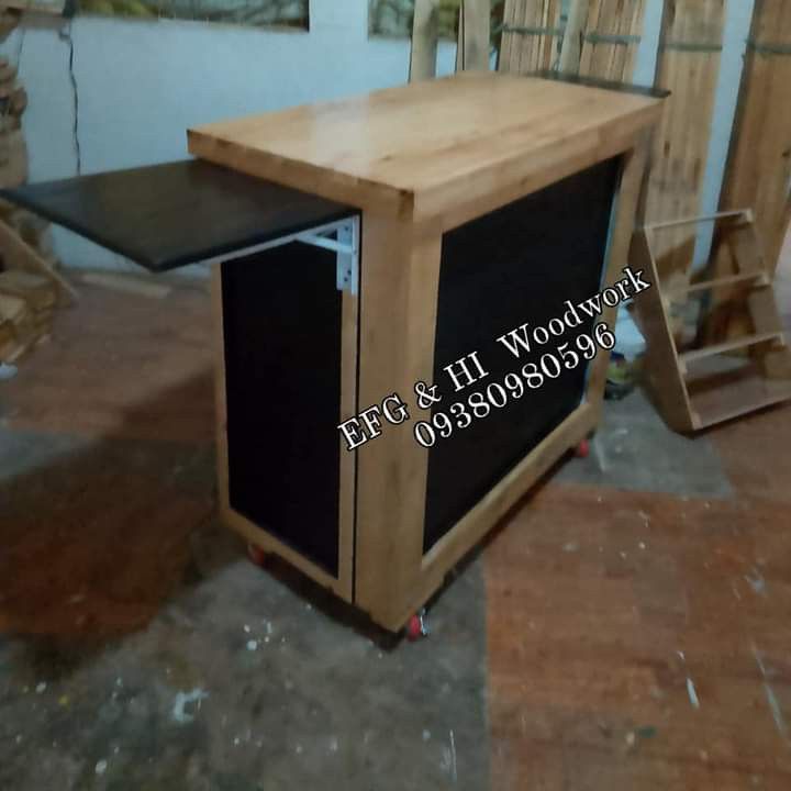 Collapsible Mobile Bar/custom Mobile cart, foldable (Category: Tables & Sets) located in Manila. Submitted by efghiwoodwork (Listing ID 1345452610, Image 2). Description: 🤍₱6,000 Foldable Mobile cart size: 40 x 20 upper table 3ft. Height ✅with lights ✅With wheels ✅with varnish ✅With paint 🤍₱7,000 Foldable Mobile cart size: 40 x 20 upper table 3ft. Height ✅with lights ✅With wheels ✅with varnish ✅With paint logo not included ✅WITH SIDE table.