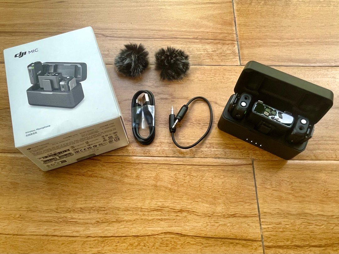 DJI (wireless) Mic 1 (Category: Microphones) located in Mandaluyong City. Submitted by xpareyes (Listing ID 1345308592, Image 2). Description: FS: DJI wireless Mic 1 complete set 2 x transmitters - 1 transmitter has fading on the logo With internal recording function on each transmitter 2 x wind screens / dead cats - never used 2 x clip magnets - with some cosmetic wear (seen in photos) 1 x receiver 1 x hot shoe adapter - never used 1 x lightning