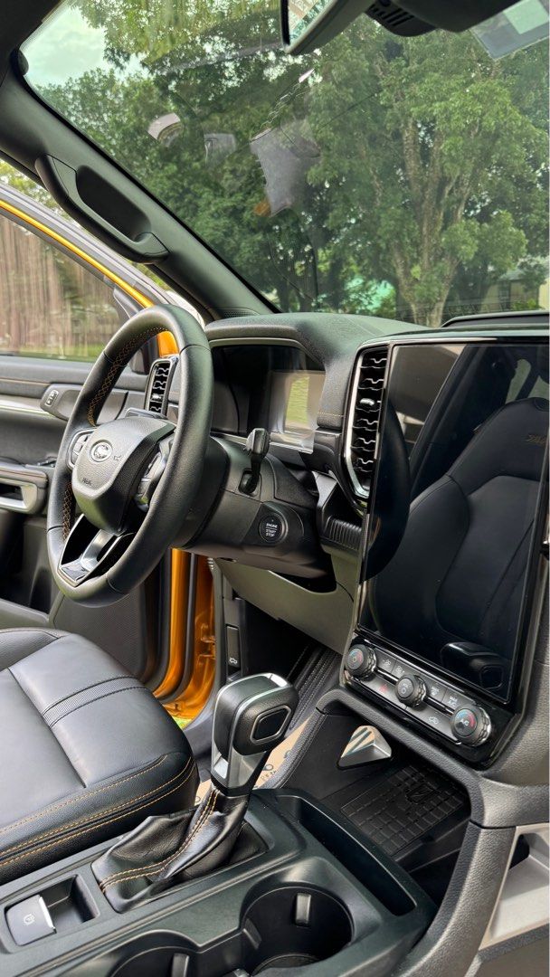 Ford Ranger (Category: Used Cars) located in Angeles City. Submitted by shasha.fierce (Listing ID 1345436355, Image 3). Description: Ford Ranger Wildtrak 4x4 Acquired July 2023 Fresh unit. Good as new. Casa maintained. Fully paid. Clean papers. Inclusions: Extra key fob. Roller lid worth 35k Cargo bar worth 8k Dish matting Free full tank fuel. Free transfer of name. City drive lang. Di pa nagamit sa rough road. For groceries lang nagagamit. 😂 Ne