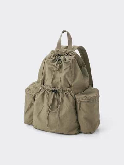GU - Soft Nylon Drawstring Backpack (Category: Backpacks) located in Pasig City. Submitted by nix_21 (Listing ID 1345428087, Image 3). Description: 💡 Details: 🔸 Colors: Black (available) & Olive (sold) 🔸 Price: ₱1,250 (on-hand, PH) 📏 Size: Length: 49 cm Width (Bottom): 29 cm Depth: 15 cm Handle (Rise): 11.5 cm Weight: 310 g 📸 Features: Soft nylon exterior with a natural surface texture. Padded back and shoulder straps for a comfortable fit. 