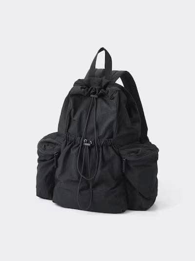 GU - Soft Nylon Drawstring Backpack (Category: Backpacks) located in Pasig City. Submitted by nix_21 (Listing ID 1345428087, Image 2). Description: 💡 Details: 🔸 Colors: Black (available) & Olive (sold) 🔸 Price: ₱1,250 (on-hand, PH) 📏 Size: Length: 49 cm Width (Bottom): 29 cm Depth: 15 cm Handle (Rise): 11.5 cm Weight: 310 g 📸 Features: Soft nylon exterior with a natural surface texture. Padded back and shoulder straps for a comfortable fit. 
