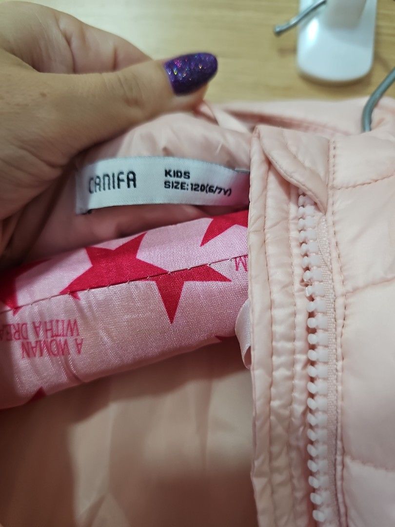 Light down jacket (Category: Babies & Kids Fashion) located in Singapore. Submitted by sindyisshopping (Listing ID 1345403911, Image 2). Description: size 120 6/7 years worn once for a few hours super light but warm.