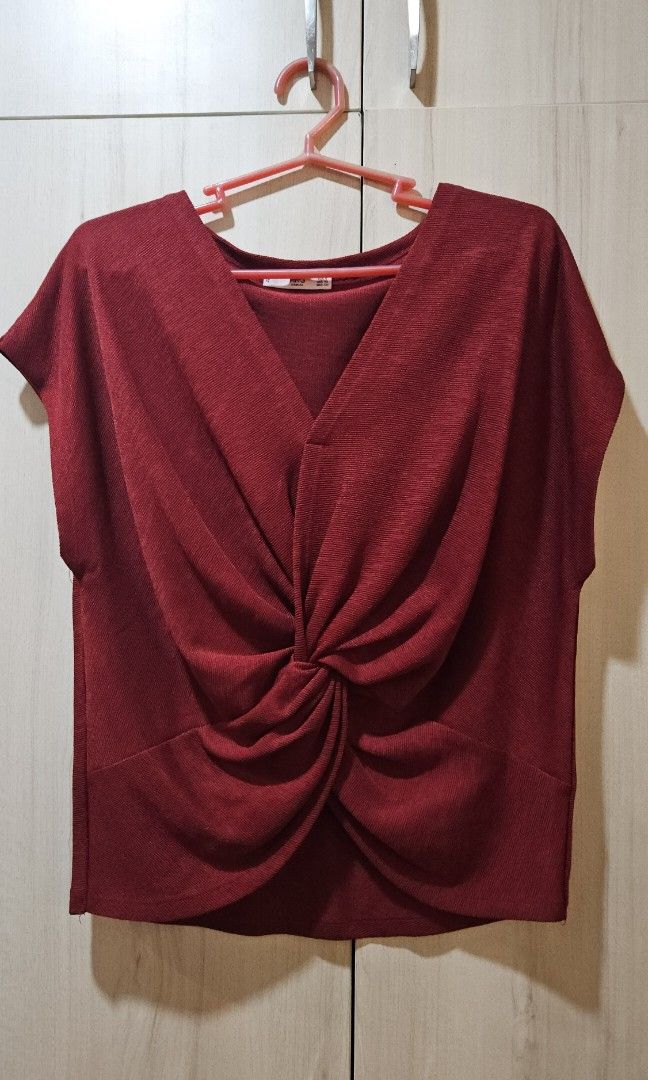 Mango Twist Blouse Top (Category: Blouses) located in Quezon City. Submitted by sunrise.declutter (Listing ID 1345335399, Image 1). Description: Rfs: decluttering Buyer to shoulder sf.