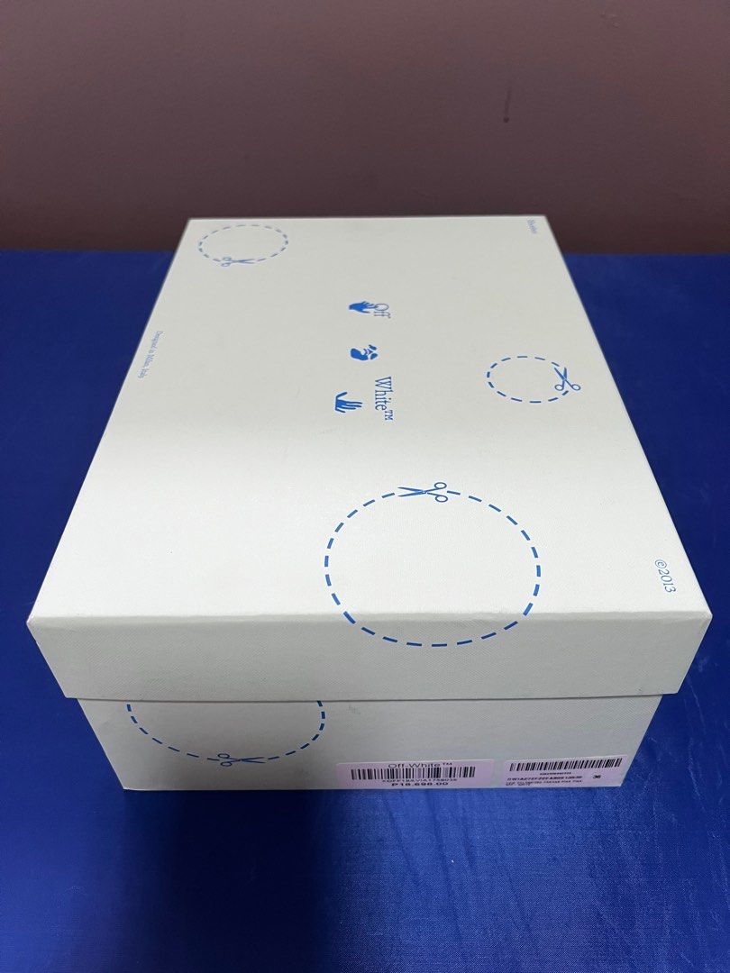 Off White Low Vulcanized Canvas Sneakers (Category: Sneakers) located in Quezon City. Submitted by decluttering25 (Listing ID 1345303315, Image 2). Description: Item in good condition 8/10 With shoe bag and box Negotiable.