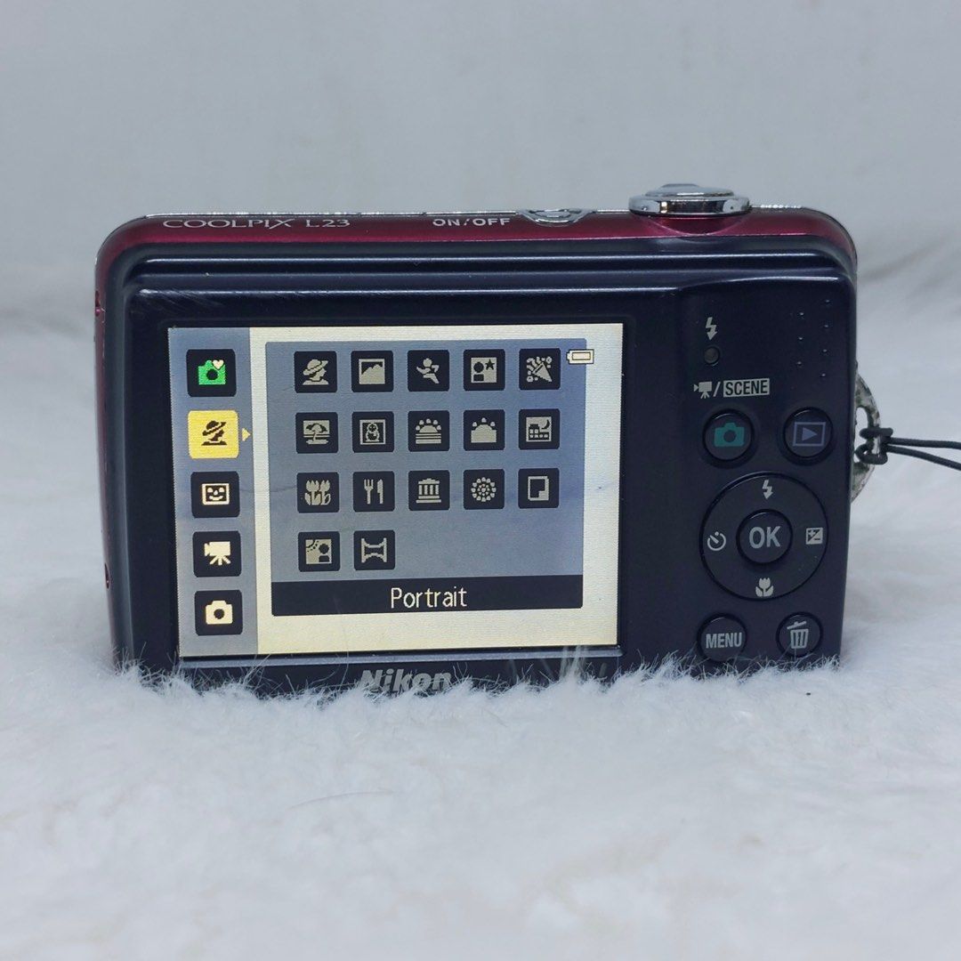 RARE Nikon Coolpix L23 Digital Camera (Category: Cameras) located in Manila. Submitted by doremicarteu (Listing ID 1345393749, Image 3). Description: kindly contact me via sms ! im currently on msg quota :( ꒰ nikon coolpix L23 ꒱ ⤷ fully functional & no issues ⤷ vintage output (9/10 cosmetics) ⤷ uses two AA batteries ⤷ sleek wine red finish🍷🪩✨ ⤷ inclus : cam, universal charger, wrist strap dm for more info ◡̈ ⌗ wts lfb digicam digital camera ph.
