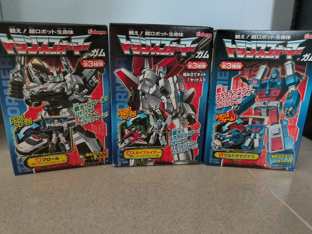 Transformers Kit (Category: Gundam Model Kits) located in Singapore. Submitted by rachael.wu (Listing ID 1345337946, Image 1). Description: set of 3 Transformers kit. box is open but kit is brand new.