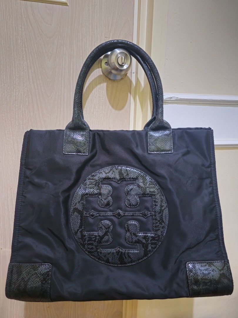 Auth Tory Burch Black Nylon and Python Embossed Leather Ella Tote (Category: Luxury Bags & Wallets) located in Las Pinas. Submitted by andthelike (Listing ID 1345581867, Image 1). Description: Tory Burch Black Nylon and Python Embossed Leather Ella Tote Authentic Size: Large Color: Black No issues It's still usable RFS: I rarely use it.