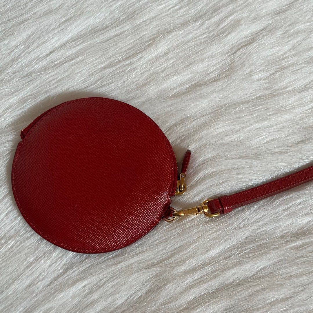 Authentic Preloved Prada Saffiano Round Wristlet with Gold Hardware (Category: Luxury Bags & Wallets) located in Quezon City. Submitted by tokyoluxestuff2013 (Listing ID 1345603370, Image 3). Description: LOWBALLERS WILL NOT BE ENTERTAINED 🚫 100% Guaranteed Authentic Comes with care card and box Excellent condition No discoloration Clean inside and out Onhand Shipping via LBC/Grab/Lalamove Add shipping fee No haggling No swapping Serious buyer o