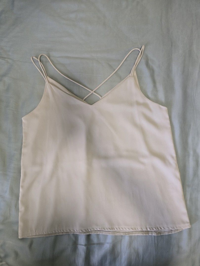 Basic Cami Tops (Category: Sleeveless) located in Singapore. Submitted by kimberbueno (Listing ID 1345586467, Image 2). Description: 1. YFS Criss Cross Back Cami Top in Ice Blue 2. Zalora Basics Navy Blue Cami Top (Size M) (SOLD) 3. Zalora Basics Blue Striped Cami Top (Size M) 4. Xiaolujia (Bugis Street) Sage Button Cami Top (SOLD) All suitable for UK10! 1 for $5 All for $15.