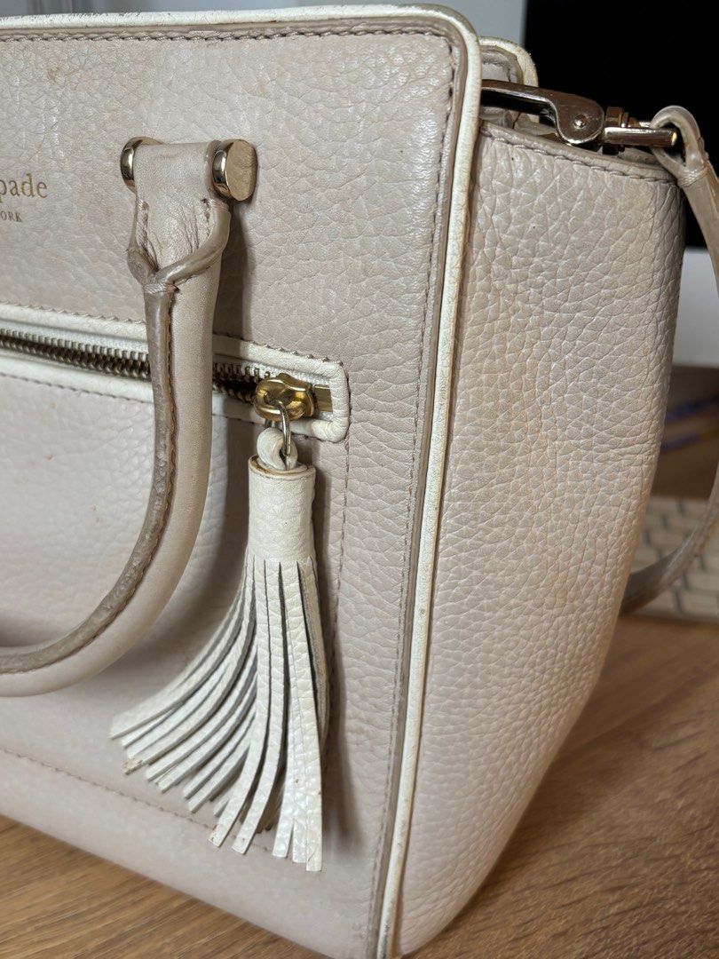 Kate Spade Chester Street Handbag (Category: Cross-body Bags) located in Las Pinas. Submitted by eggspresso (Listing ID 1345680877, Image 3). Description: RFS: Decluttering Please check photos for close up photos This was well used and loved so there are obvious signs of wear and tear This is spacious and structured too! Zippered pocket on front with tassel detail Detachable, adjustable crossbody strap 2 inside pockets Can fit iPad air 10.9” for 