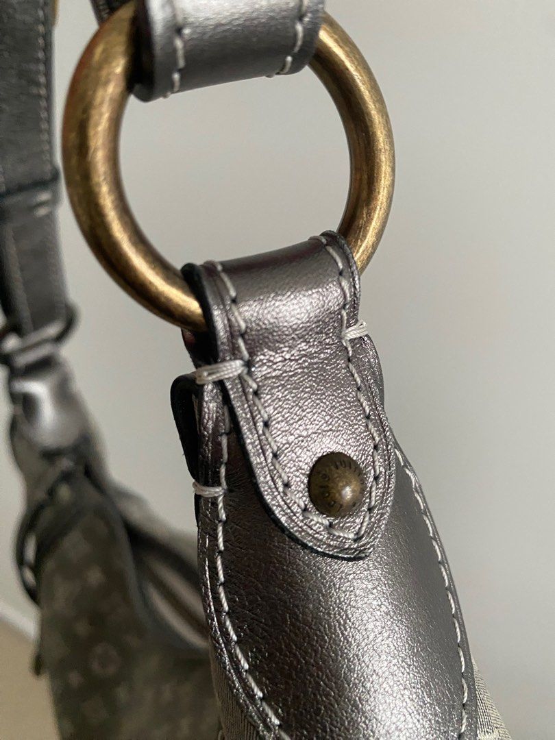 Louis Vuitton Shoulder Bag (Category: Luxury) located in Markham. Submitted by abglchin (Listing ID 1345701866, Image 3). Description: Style: Manon PM Platine Condition: 9.5/10 (used maybe 3x maximum) Other Notes: - textile body with leather strap - strap is not removable - original dust bag included Location: York Region; in-person meet up preferred, willing to meet buyer halfway.