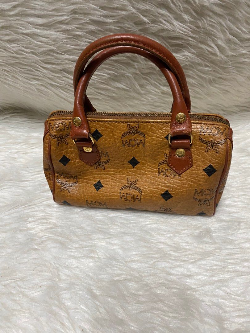 MCM mini bag Authentic (Category: Luxury Bags & Wallets) located in Malolos. Submitted by yamaguchionline (Listing ID 1345589331, Image 2). Description: Bought in Japan guaranteed authentic money back if proven fake.very nice in actual.please respect my ads.