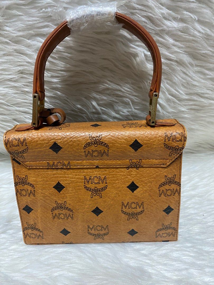MCM mini Kelly bag Authetic (Category: Luxury Bags & Wallets) located in Malolos. Submitted by yamaguchionline (Listing ID 1345588647, Image 2). Description: Bought in Japan guaranteed authentic money back if proven fake.very nice in actual.please respect my ads.