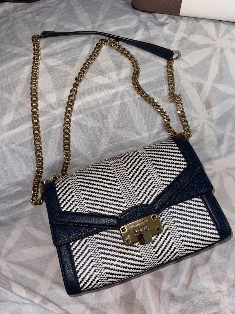 Michael Kors 2-way banig style (Category: Cross-body Bags) located in Subic. Submitted by e-clutter (Listing ID 1345633877, Image 1). Description: guaranteed authentic minor minor rubs/scratches on the body - tolerable minimal to no fade on hardwares 3rd pic for reference pm for more pics and info.