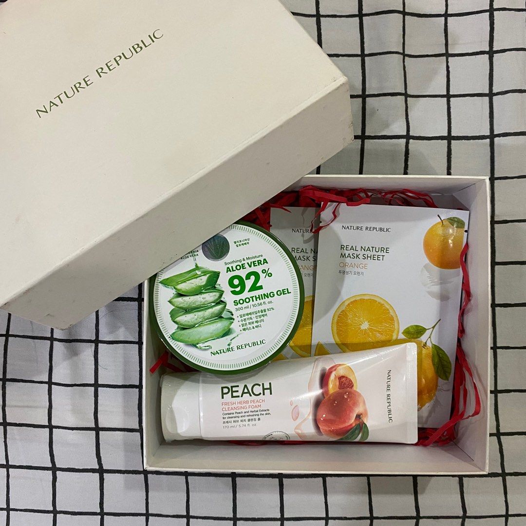 Nature Republic Gift Set (Category: Face Care) located in Antipolo. Submitted by de.klutter (Listing ID 1345639111, Image 1). Description: Nature Republic Korean Skincare Gift Set Includes the ff.: - 300ml Aloe Vera Soothing Gel - 170ml Fresh Herb Peach Cleansing Foam - 2 pcs. Orange Real Nature Mask Sheet face masks CONDITION: Brand new, all products inside never opened.