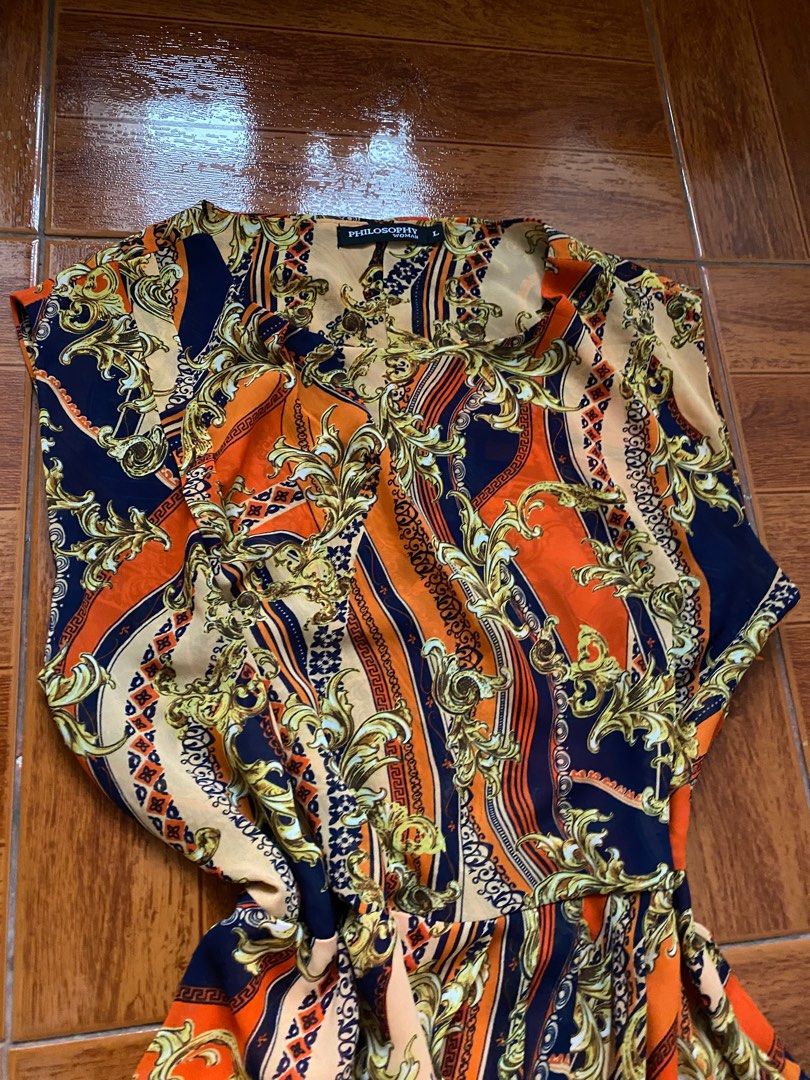 Orange Floral Dress (Category: Dresses) located in Quezon City. Submitted by koreii (Listing ID 1345626381, Image 2). Description: 🛍️ Orange Floral Dress🛍️ 📌L:36 B: 50 W: 40 📌Fits L-XL 📌With working side zipper 📌WYSIWYG 📌For sure buyers only 📌All items are in good condition unless stated otherwise😉 ✅MOP: Gcash ✅MOD: JnT, lalamove ✨Don’t be shy to dm me if interested✨ ❗️STRICTLY NO CANCELLATIONS PO❗️ 🌷HAPPY SHOPPING🌷.