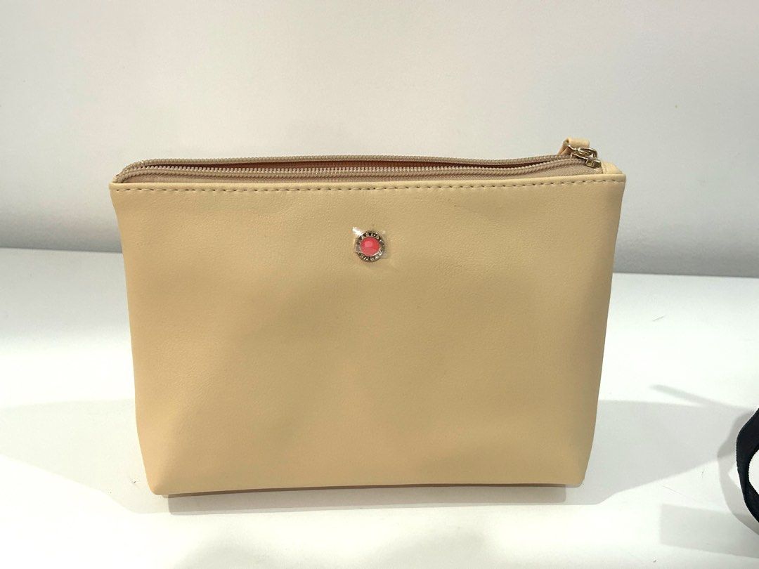 Two Bulgari Travel Vanity Kits (Category: Purses & Pouches) located in Paranaque City. Submitted by cfcisco (Listing ID 1345559497, Image 2). Description: Two Bulgari Travel Vanity Kits Peach for Women Black for Men Php600 for both.