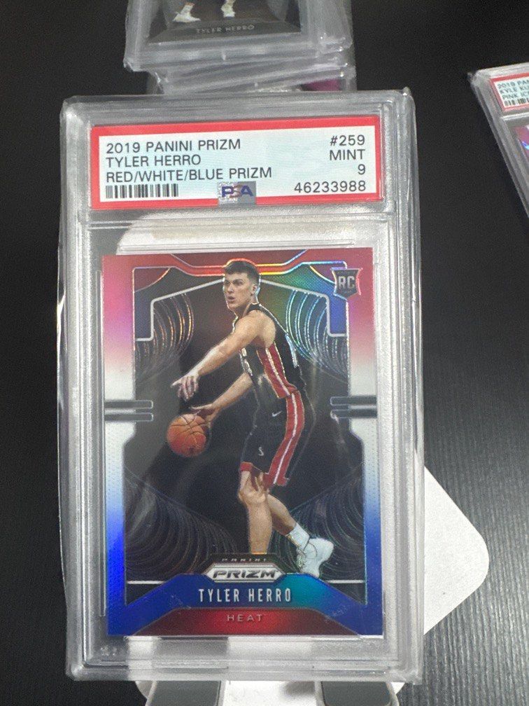 Tyler Herro Red/White/Blue Prizm PSA 9 (Category: Graded Singles) located in Manila. Submitted by CornerStore (Listing ID 1345597225, Image 1). Description: For sale rare tyler herro red white blue pirzm Graded: PSA 9 Location: Marikina Can do SDD or LBC shipping shouldered by buyer.