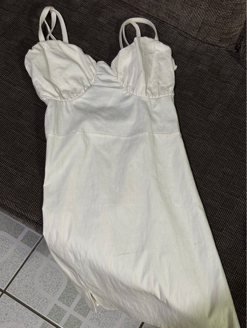 White Linen Tie Dress (Category: Dresses) located in Paranaque City. Submitted by floramese (Listing ID 1345659704, Image 1). Description: Used twice only, then was stored afterwards. ✿ lovely dress that i adore! (perfect for dates as well, day or night) ✿ this piece is perfect for a soft baddie look ✿ makes your body look snatched ✿ thick fabric ✿ issue!: there’s a small line of dirt at the bottom part of the dress. though, it isn’t so noticeabl