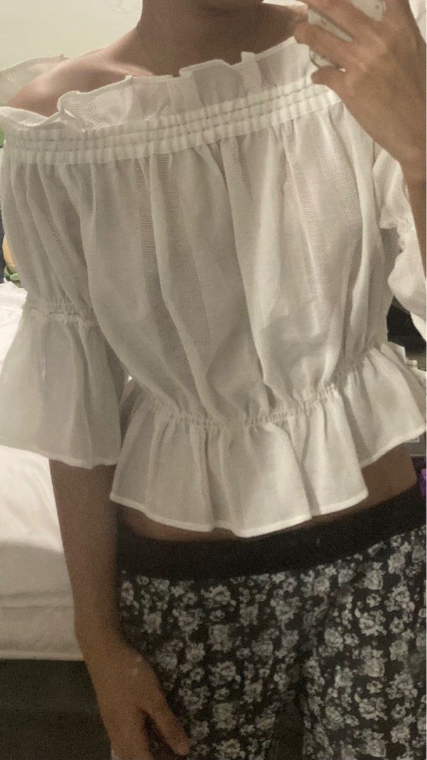white off shoulder blouse (Category: Blouses) located in Santo Niño. Submitted by starrin (Listing ID 1340539775, Image 3). Description: used twice.