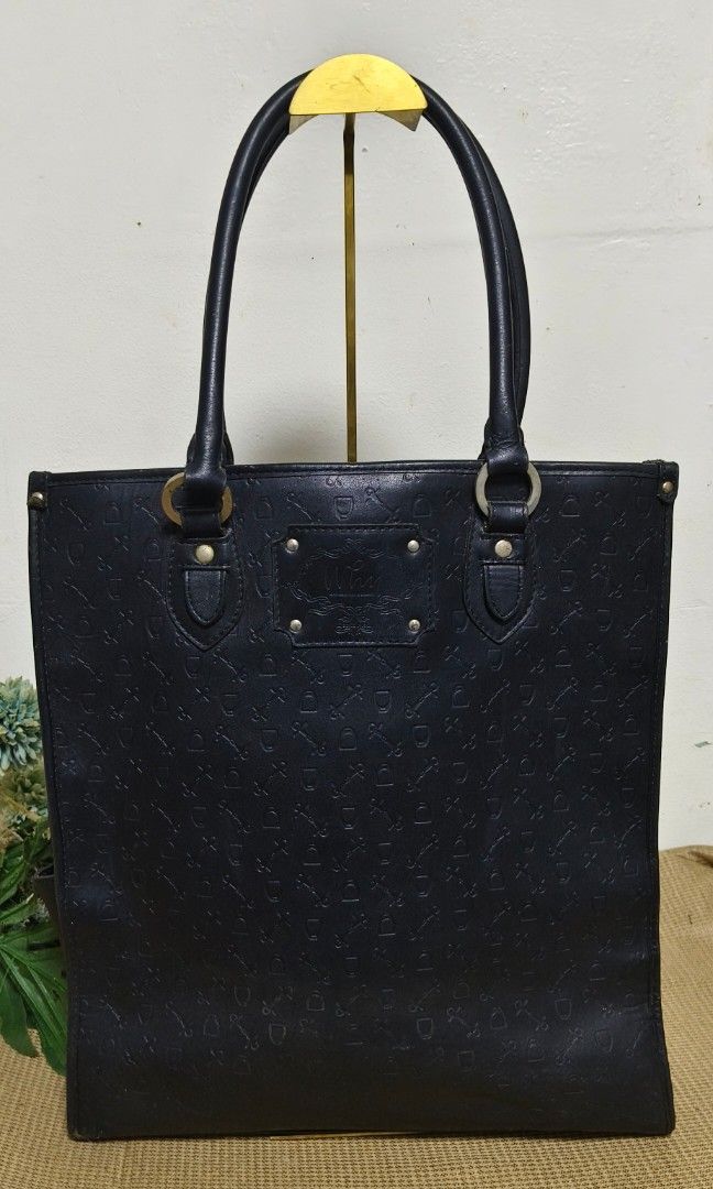 WHY Genuine Leather Classic Bag (Category: Luxury Bags & Wallets) located in Baguio. Submitted by PreiLoveMaria (Listing ID 1345692863, Image 1). Description: WHY Genuine Leather Classic Bag Vintage Rare Find 15" Laptop can fit in the Bag Good for office or school use Monogram Design Normal signs of wear, needs cleaning on the metal hardware.. Kindly check individual photos for details... Open for shipping via J&T onLy We do not offer COD/COP 😊.
