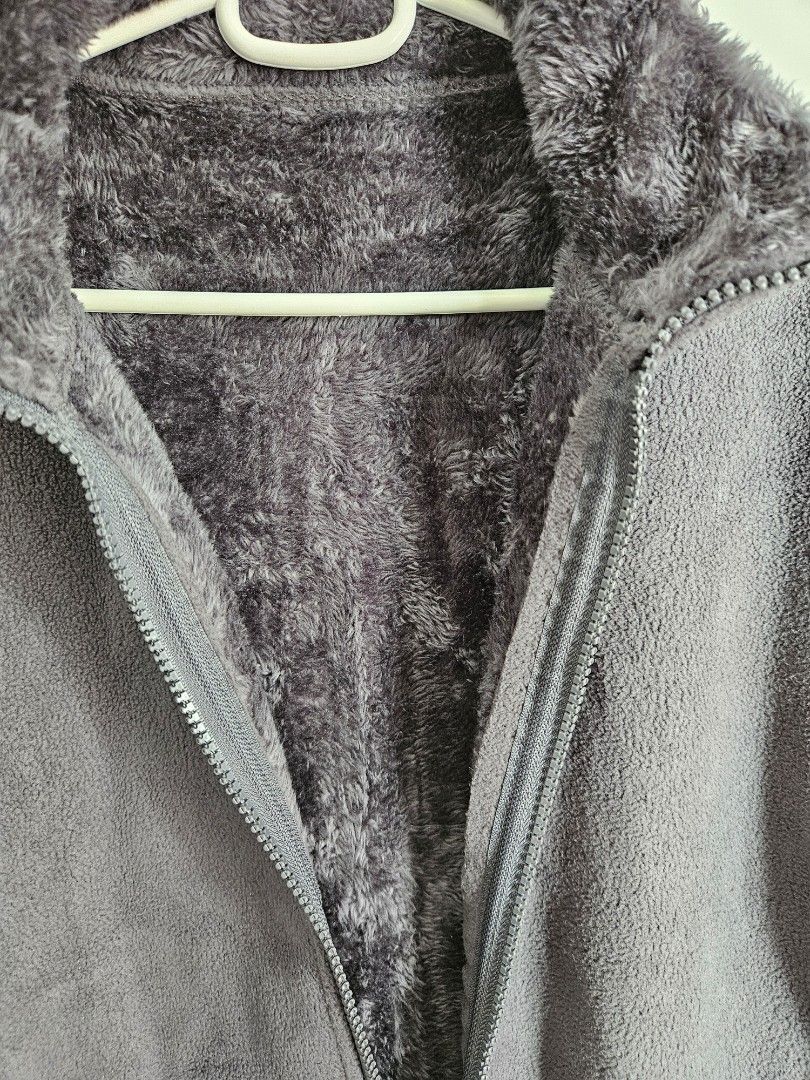 Winter Jacket (Category: Coats, Jackets and Outerwear) located in Singapore. Submitted by lmseow69 (Listing ID 1345590170, Image 2). Description: Grey polyester fleece jacket. Good as new - used during trip to Xian in winter. Shoulder to shoulder: 49cm Indicated is 2XL, but feels like L..