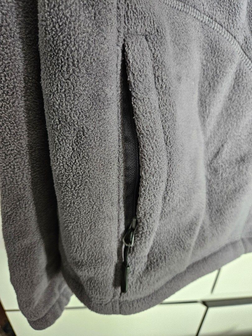 Winter Jacket (Category: Coats, Jackets and Outerwear) located in Singapore. Submitted by lmseow69 (Listing ID 1345590170, Image 3). Description: Grey polyester fleece jacket. Good as new - used during trip to Xian in winter. Shoulder to shoulder: 49cm Indicated is 2XL, but feels like L..