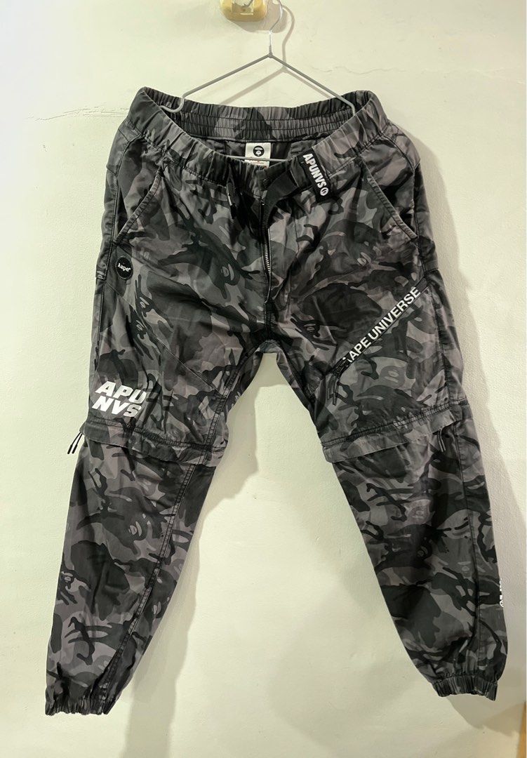 AAPE UNIVERSE BLACK CAMOU Convertible (Category: Joggers) located in Quezon City. Submitted by shemps (Listing ID 1345807719, Image 1). Description: AAPE UNIVERSE BLACK CAMOU Detachable/Convertible Pants *** Small on Tag Color and Condition Rate: 9.8/10 *** Please see detailed pictures .