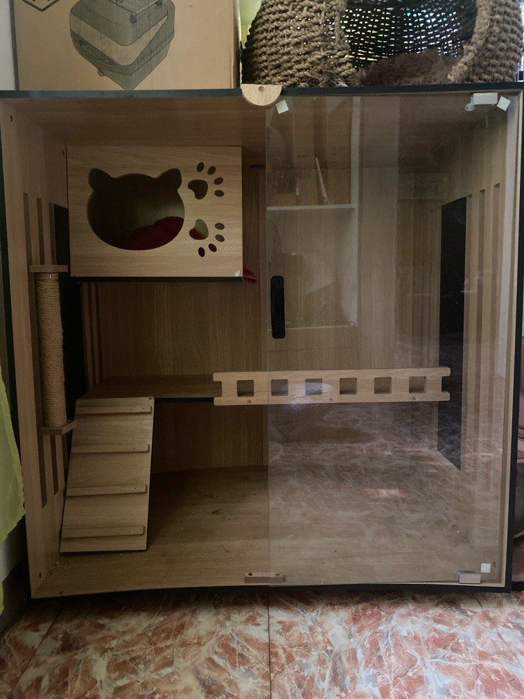Cat house (wood) (Category: Other Home Furniture) located in Quezon City. Submitted by muneng0909 (Listing ID 1345738421, Image 1). Description: Selling this cat house, as my cats are not using since they’re used to stay on my room and bed. Issue : only one glass nalang po yung lock pero pwede kayo pagawa sa mga kakilala nyo. Good condition pa naman po ibang parts, ayan lang talaga cos nabasag. Size 90x60x90 Original price is 6200.