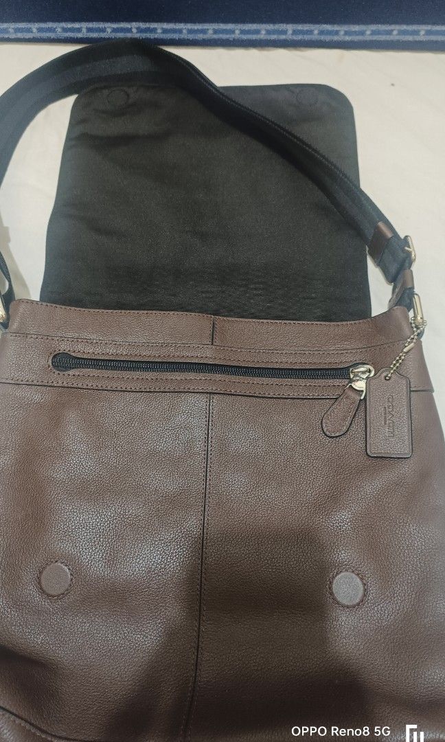 Coach leather sling bag (Category: Luxury Bags & Wallets) located in Paranaque City. Submitted by eyzmartin (Listing ID 1345896513, Image 2). Description: used but still in good condition. check pic. for details.