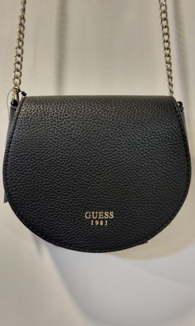 Guess Bag (Category: Cross-body Bags) located in Manila. Submitted by miajoaquin (Listing ID 1345887174, Image 3). Description: GUESS Cate Mini Saddle Crossbody Bag Classic sophistication with a touch of contemporary edge. GUESS's textured saddle bag puts a pop of sleek style in your look. BNWT and bag stuffing but with minor flaw on strap - see last photo..