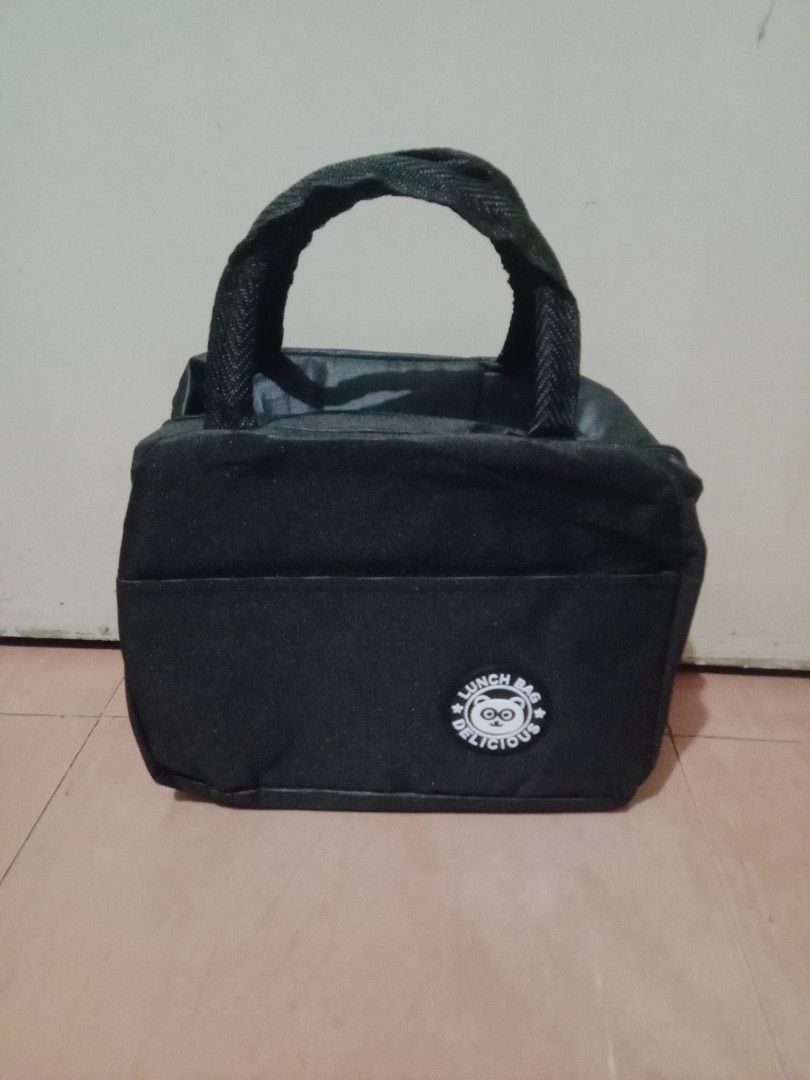 Insulated Lunch Bag (Category: Weaning & Toddler Feeding) located in Manila. Submitted by thezeeshop (Listing ID 1345778545, Image 1). Description: Has pockets outside Insulated Available colors: black and gray 💳 GCash / Cash 🚚 Lalamove / QuickTime Courier / LBC COP/ pickup 📍 Meetup: LRT Quirino Station ❌COD and other checkouts ) Reminders: ◾If in doubt, don't make an offer. Let's not waste each other's time. ◾Sure buyers ONLY. Wag magmessage 
