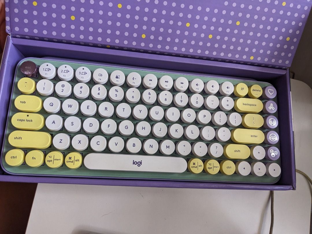 Logitech POP Keys Mechanical Keyboard (Category: Computer Keyboard) located in Quezon City. Submitted by scentedplastic (Listing ID 1345801647, Image 2). Description: Used Logitech POP Keys (Daydream color) Product details here: https://www.logitech.com/en-us/products/keyboards/pop-keys-wireless-mechanical.920-010708.html Complete with box, replacement emoji keys, bluetooth connector. Bought for P6,000 last 2022! RFS: Ayoko na ng mechanical keybo