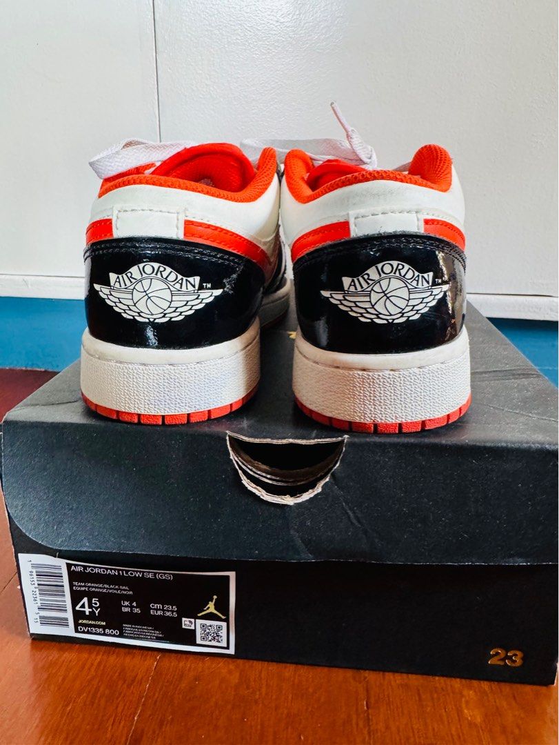 Nike Air Jordan Low SE 4.5Y (Category: Babies & Kids Fashion) located in Batangas. Submitted by GDW98 (Listing ID 1345820287, Image 1). Description: Brand: Nike Condition: lightly used, no flaws Color: black, white, red-orange Size: 4.5Y RFS: outgrown MOP: gcash .