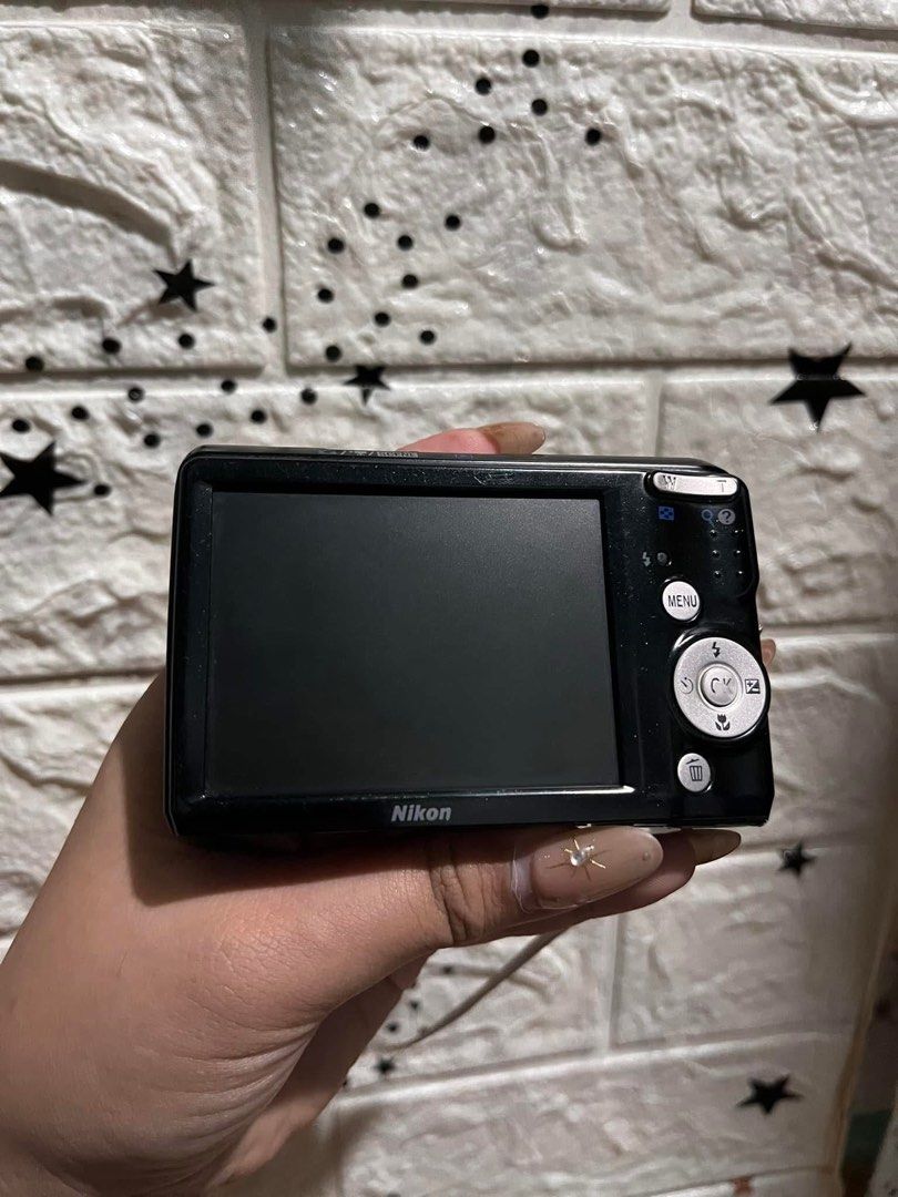 NIKON COOLPIX L20 (Category: Cameras) located in Manila. Submitted by zekrivera (Listing ID 1345772532, Image 2). Description: NIKON COOLPIX L20 10.0 Megapixels 3.6x optical zoom (Equivalent to 38-136mm in 35mm format). 3.0-inch LCD with 230,000 dots resolution. ‼️REPRICED‼️ ₱5,000 (from ₱5,500) Inclusions: Unit itself, SD Card, pouch, lanyard & Battery. ISSUE: broken battery door look need to be taped All digital cameras are pre-owned and displa