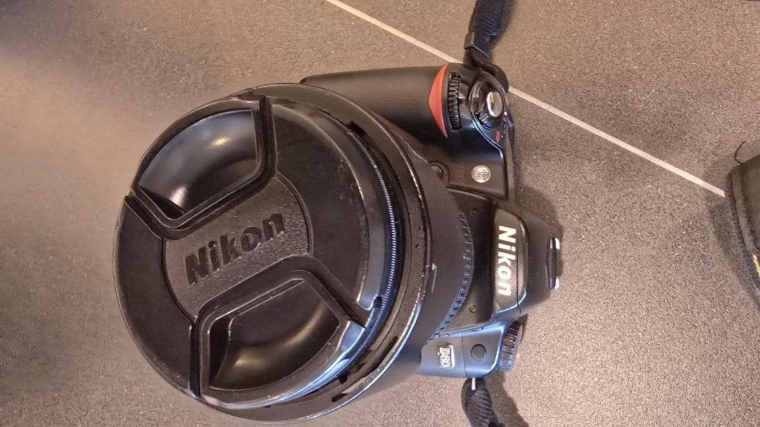 Nikon D80 DSLR with 2 lenses (Category: Cameras) located in Paranaque City. Submitted by olxph_23709942 (Listing ID 1345780195, Image 2). Description: d80 kit with Nikkor 18-135mm f3.5-5.6 Nikkor 50mm f1.8 and everything in the photo sold as set take note that shutter needs cleaning and fixing and battery is bloated.