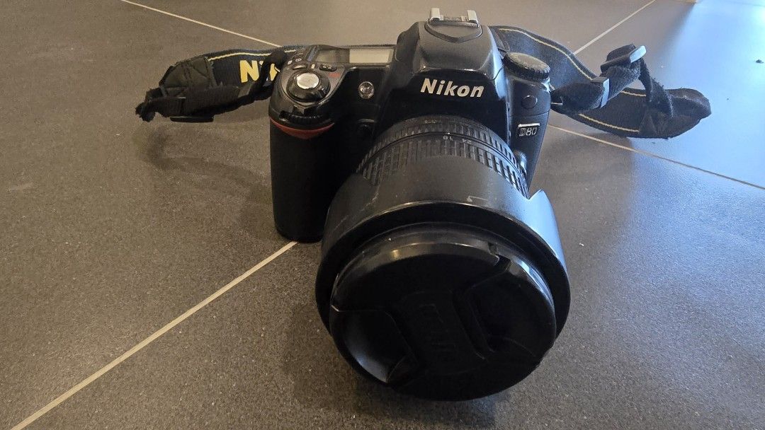Nikon D80 DSLR with 2 lenses (Category: Cameras) located in Paranaque City. Submitted by olxph_23709942 (Listing ID 1345780195, Image 1). Description: d80 kit with Nikkor 18-135mm f3.5-5.6 Nikkor 50mm f1.8 and everything in the photo sold as set take note that shutter needs cleaning and fixing and battery is bloated.
